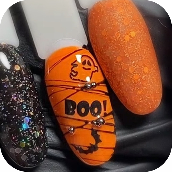 Unghie a tema halloween arancioni